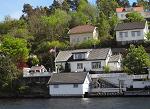 The home of Nils Petter Tempelen and Kari Westbø where we docked and had dinner - notice they're flying the American flag for us